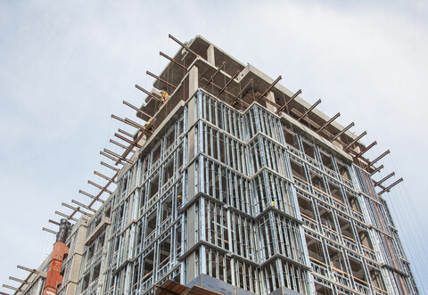multi-story cold-formed steel frame building under construction
