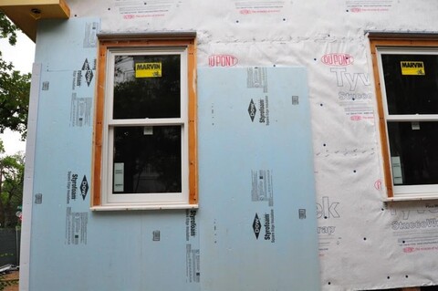 Window flashed to a separate WRB material 