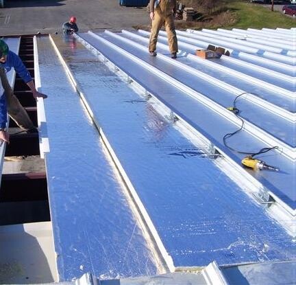 Installation of FPIS ci on roof purlins and below metal roofing 